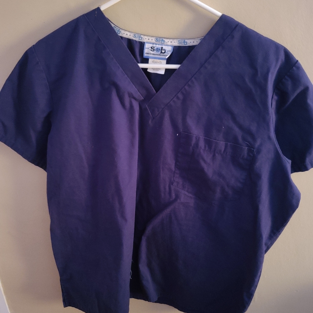 Blue scrub top Scrubs and Beyond